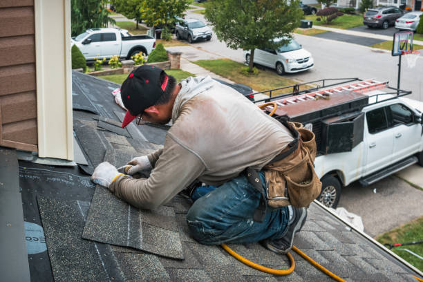 Professional Flat Roof Repair technician working in Danville, NH